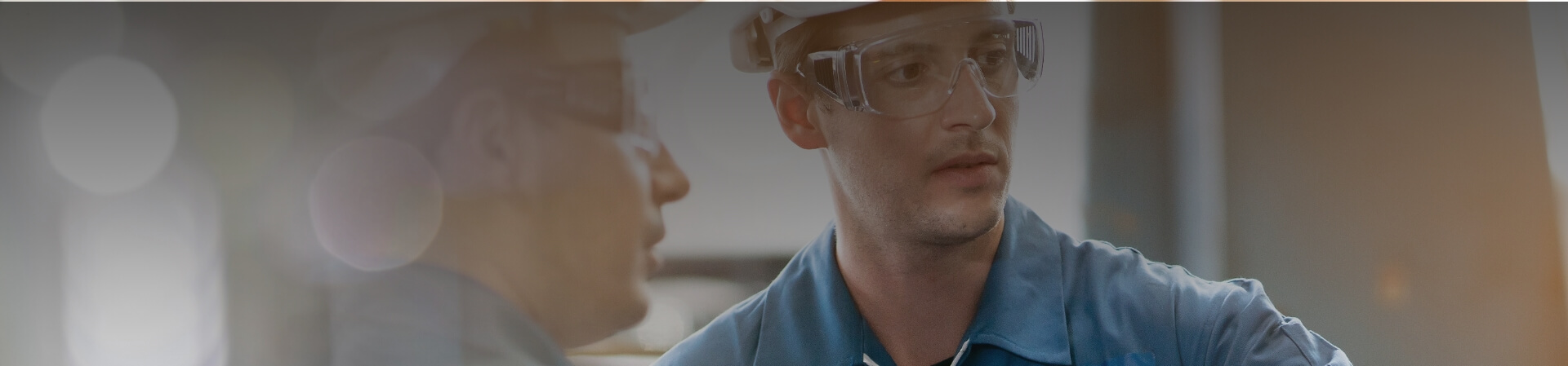 Men in safety glasses image